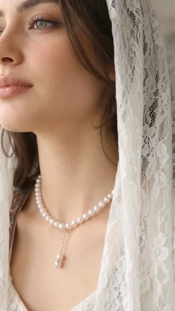 Soft daylight portraits with pearl necklace and product close-ups.